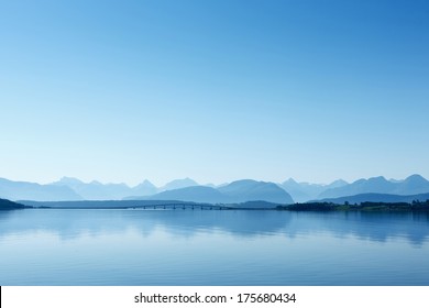 Remote View At The Atlantic Ocean Road, Norway. Misty Mountain Landscape In The Hazy Weather.