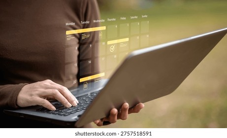 Remote work concept with person using laptop and digital calendar interface outdoors. Represents productivity, time management, scheduling, freelance work and modern flexible working lifestyle.