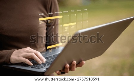 Remote work concept with person using laptop and digital calendar interface outdoors. Represents productivity, time management, scheduling, freelance work and modern flexible working lifestyle.