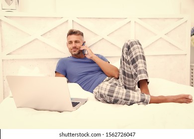 Remote Work Concept. Social Networks. Online World. Man Surfing Internet Work Online. Already At Work. Digital Marketing. Remote Access. Hipster Bearded Guy Pajamas Freelance Worker Relaxing At Home.