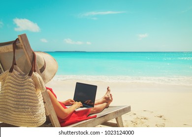 Remote Work Concept -young Woman With Laptop On Beach