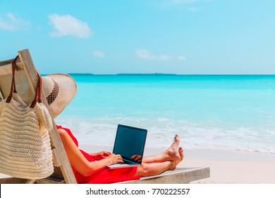 Remote Work Concept -young Woman With Laptop On Beach