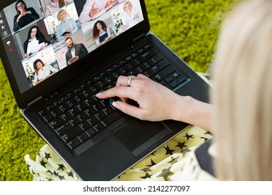 Remote Work. Group Video Call. Corporate Webcast. Female Freelancer Using Laptop Cooperating Online With Colleagues On Screen In Virtual Office.