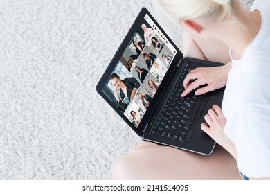 Remote Work. Video Call. Corporate Webcast. Female Freelancer Using Laptop Cooperating Online With Team On Screen In Virtual Home Office.