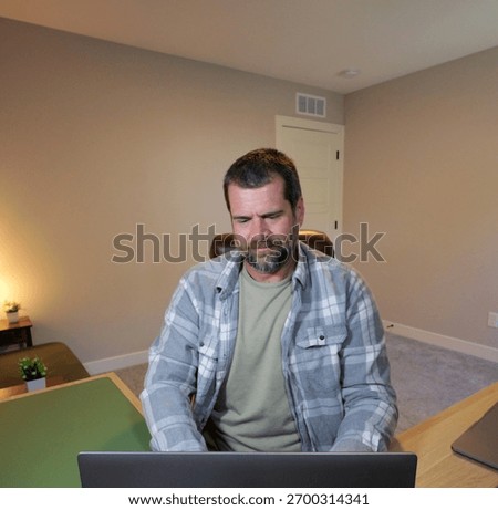 Remote Worker Struggling to Keep Sanity While Being Lonely Trying to Problem Solve in Dark Winter Days