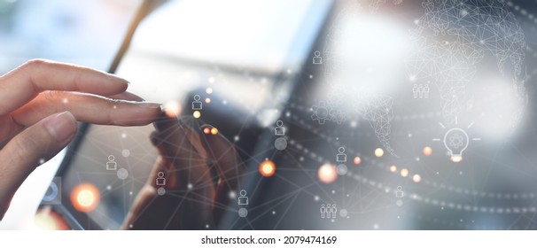 Remotely work, social network connection, global business, telecommuting, telecommunication concept. Woman touching on digital tablet computer connecting  internet network connection on virtual screen