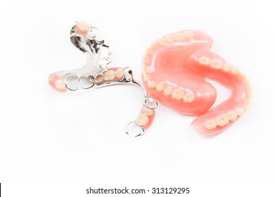 removable partial denture on white background.