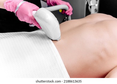 Removal Of Excess Hair In The Bikini Area Or The Abdomen Of A Man. Laser Hair Removal Procedure In A Beauty Salon. Body Care. White Underpants