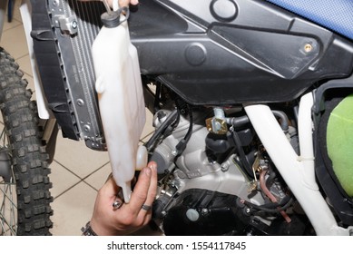 Removal, installation of a tank of the oil cooling system on a motorcycle. Troubleshooting a node.