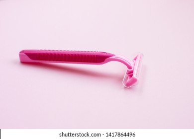 Removal Of Unwanted Hair, Concept. Disposable Shaving Machines For Women. Flat Lay Pink Background.