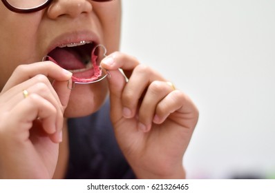 Remove retainer before eating