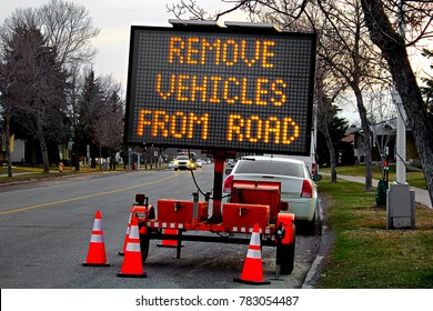 A remove vehicles from road billboard in spring.