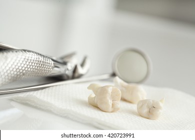 Removed wisdom tooth on white - Shutterstock ID 420723991