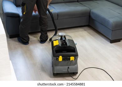 Removing Dirt From Sofa With Upholstery Cleaner, Closeup