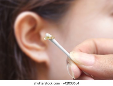 Removing Ear Wax Using A Cotton Bud                                     