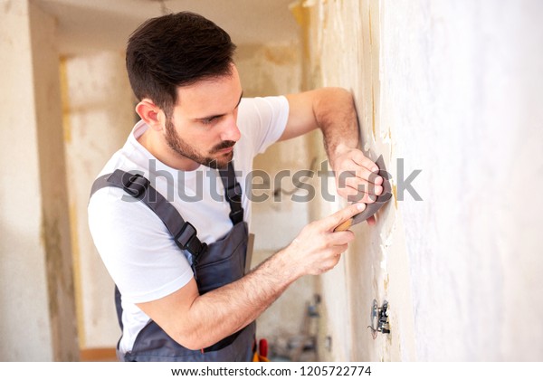 Removing Old Wallpaper Wall Putty Knife Stock Photo Edit Now 1205722774