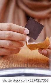 removing packet from a chocolate 