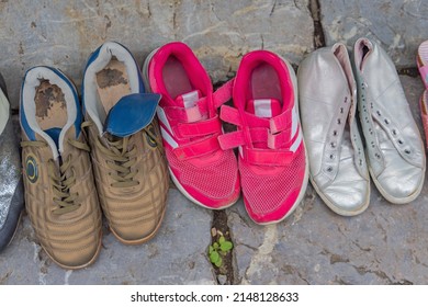 Removing Snickers Shoes In Front Of Home Tradition