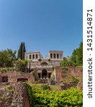 the renaissance Farnese aviaries fully restored building standing between the gardens on palatine hill under clear blue sky, Rome Italy