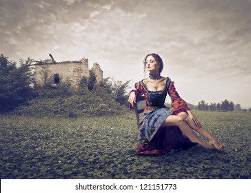 Renaissance Woman On A Lawn