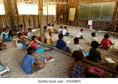 RENARD ISLANDS, PNG - JULY 14: Unidentified Melanesian Children Of Papua New Guinea In School. July 12, 2009, Bwagaoia, Misima Island, Papua New Guinea