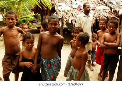 RENARD ISLANDS, PNG - JULY 16: Unidentified Melanesian People Of Papua New Guinea. July 16, 2009, Bwagaoia, Misima Island, Papua New Guinea