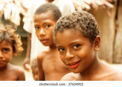 RENARD ISLANDS, PNG - JULY 16: Unidentified Melanesian Children Of Papua New Guinea. July 16, 2009, Bwagaoia, Misima Island, Papua New Guinea