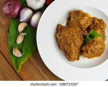 RENDANG AYAM/CHICKEN RENDANG. A Kind Of Traditional Dish Usually Served During Eid Festival. Selective Focus. Top View.