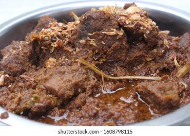 rendang daging of beef rendang is one of type traditional cuisine from Padang, Indonesia. selective focus