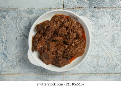 Rendang Is A Dish Made From Authentic Indonesian Meat Originating From Minangkabau. This Dish Is Produced From A Long Low-temperature Cooking Process Using Various Spices And Coconut Milk.