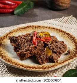 Rendang is an Indonesian West Sumatra Minangkabau spicy meat (commonly beef) that slow cooked in coconut milk and mixed spices