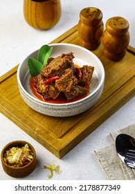 Rendang Is A Meat Dish Originating From West Sumatra, Indonesia. The Process Of Cooking Rendang At Low Temperatures For A Long Time, Using Coconut Milk And Various Indonesian Spices. Selective Focus