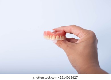 render of mandibular prosthesis all on 4 system supported by implants over white background