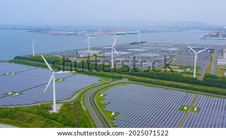Renewable energy concept. Solar power plant and wind power plant aerial view.