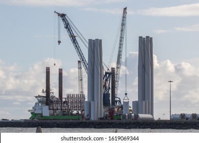 Renewable Energy And Green Power Industry Investment. Wind Turbine Construction And Transport. Offshore Wind Farm Towers Manufacturing And Transportation. Great Yarmouth Outer Harbor UK