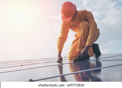 Renewable energy and solar power concept, worker or Electrical engineers are checking and training installing  photovoltaic plant in solar power station alternative energy from nature