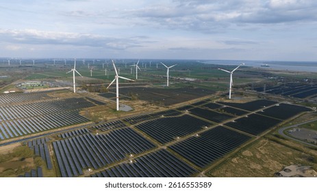 Renewable sustainable energy in Germany. wind turbines and solar panels. Aerial view.