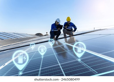 renewable,Energy,sustainable.technician professional engineer control checking top view of installing solar roof panel on the factory rooftop under sunlight.Engineers holding tablet check solar roof. - Powered by Shutterstock