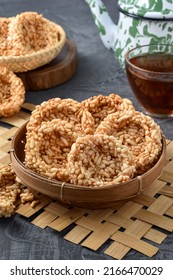 Rengginang or Ranginang is Indonesian thick rice cracker, made from cooked glutinous sticky rice and seasoned with spices and deep fried with ample cooking oil to produce a crispy rice cracker.