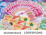 Renminbi and Hong Kong dollar banknotes With Coins