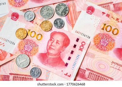 Renminbi Official Currency Of China. Abbreviation RMB. Yuan Basic Unit Of The Renminbi. Set Of One Hundred Yuan Close Up. Coins And Paper Bills. Chinese Money. Business Concept.