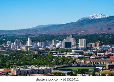 RENO - MAY 31: Reno skyline on May 31, 2016. It's known as The Biggest Little City in the World, famous for it's casinos and the birthplace of the gaming corporation Harrah's Entertainment.
