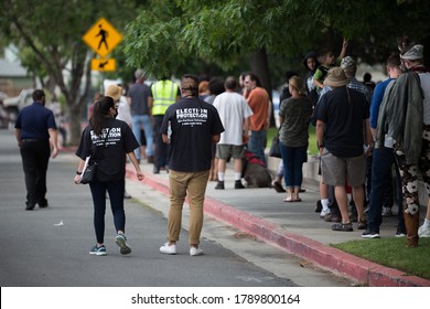 Reno, Nevada / USA - June 9 2020: Voters And Campaign Staff Wear Masks During The 2020 Primary Election Day In Nevada.