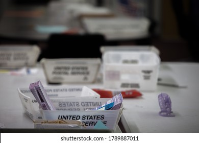 Reno, Nevada / USA - June 9 2020: Election Poll Workers Count Vote By Mail Ballots From United States Postal Service Boxes During Nevada's 2020 Primary Election. 