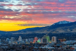 Reno Radiant Dawn: Panoramic 4K View Of The Nevada City At Sunrise With Cloudy Sky
