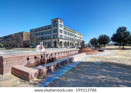 Renovated downtown landscape featuring a water fountain