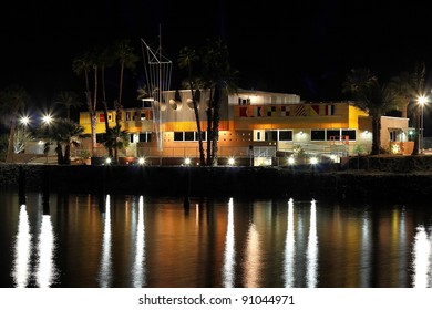 Renovated North Shore Beach & Yacht Club At The Salton Sea At Nighttime. Reflections On The Water. Desert Modern Architecture By Architect Albert Frey.