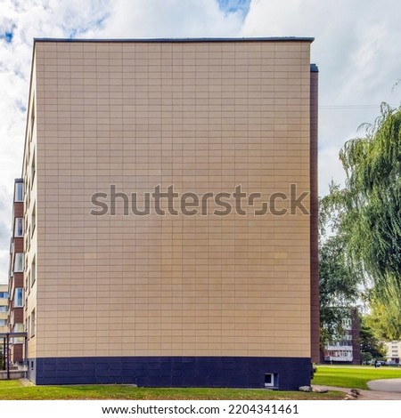 Renovated old Soviet-era apartment building side exterior wall. Panevezys. Lithuania. 15. 09. 2022.