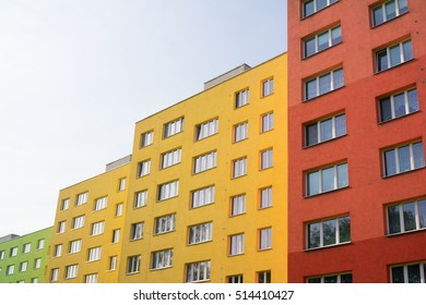 Renovated and renewed complex of blocks of flats - building has colorful facade. Cheap social housing for poor people. Low angle shot with copy space area (dynamic composition) - Powered by Shutterstock