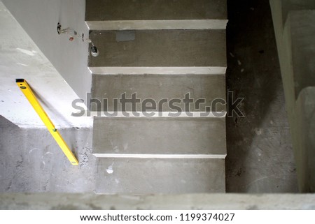 Renovation in the country house, cement walls and steps. 